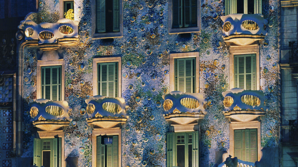 Rippling shades of blue form the exterior of the lavish Casa Batlló